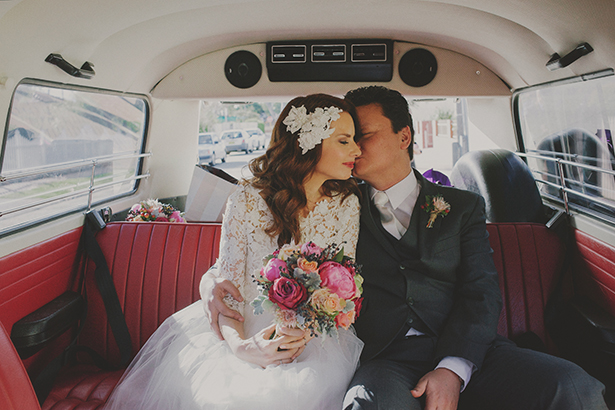 Bride and Groom in Retro Car